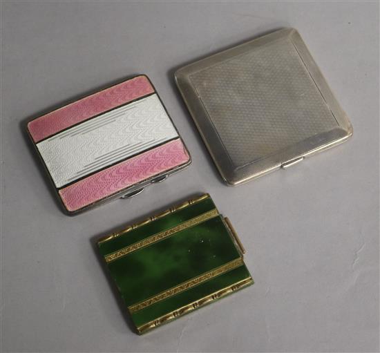 A George V silver cigarette case, an enamelled cigarette case and a compact.